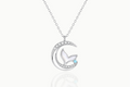 Front view of the Mermaid's Tale 925 sterling silver moon and mermaid tail necklace